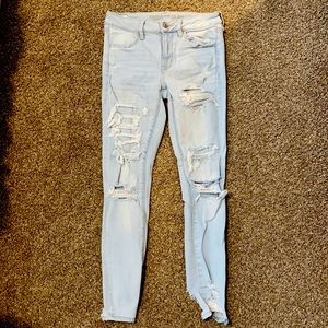 Light blue ripped jeans
